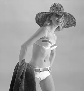 1960s bikini fashion. A fashion model in a bikini in 1963