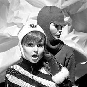 In the 1960s. Fashion models, in typical 1960s winter clothes in a studio