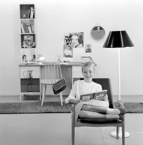 In the 1960s. A teenage girl in her typical 1960s room