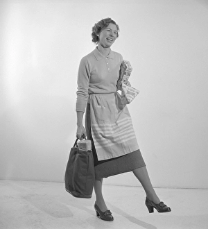 In the 1960s. A woman with her shopping bag. The classic Tetran milk package is visible. Invented by Ruben Rausings employee Erik Wallenberg in a tetrahedron form, that became the start of the Tetra Pak packaging empire. Sweden 1960. Conard ref 4188