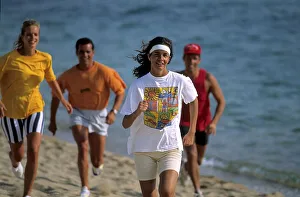 2 couples on the beach, beach run jogging