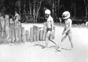 2 with motorcycle helmet on the beach