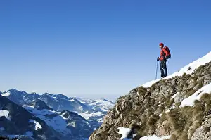 22-year-old woman, hiking in the pre-Alps in Winter