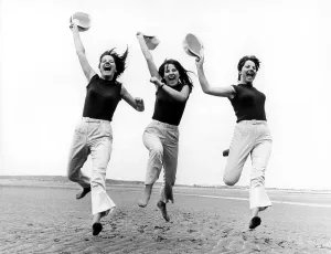 3 women on the beach, England, Great Britain