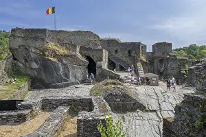 9th century medieval ruined hill castle overlooking the city La Roche-en-Ardenne in summer
