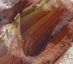 Detail of a a colorful rock formation in the Libyan Desert