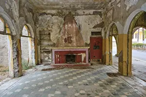 Abandoned room with ruined floor and walls