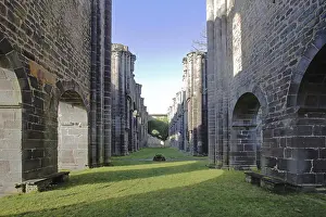 Abbey ruins with archway, former Cistercian abbey