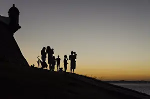 Adults and children at sunset, Farrol da Barra