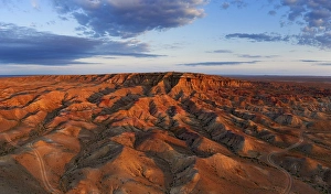 Category Buddhism Prints: Aerial panorama of textural colorful striped canyons Tsagaan suvarga