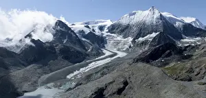Aerial view, Alpine panorama, mountain landscape with glacier tongue and glacier lake