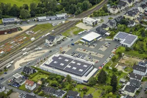 Aerial view, Bahnhofstrasse shopping centre with Rewe supermarket and solar roof