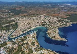 Aerial view, beach and marina of Porto Cristo