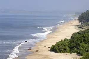Aerial view of Blue water Arabian sea with greenery and tourists