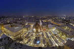 Aerial view, Christmas market on the main market square with the Church of Our Lady in the snow