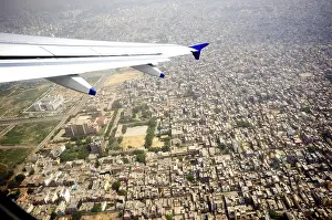 Category Historic EN Prints: Aerial view of city and aircraft wing