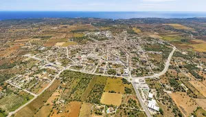 Aerial view, city ring and town view with church Sant Andreu in Santanyi