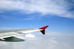 Category Historic EN Prints: Aerial view of clouds and aircraft wing