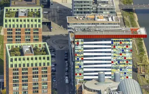 Aerial view, Colorium Hotel Innside Dusseldorf harbour and artistic coloured glass panel facade