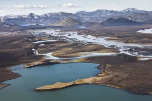Aerial view of the colourful mountains and waters between the waterways of the Tungna River and Lake Langisjoer