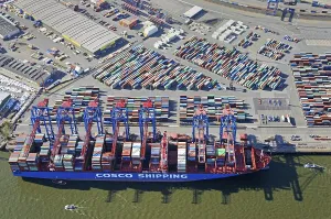 Aerial view of a container ship of the Chinese shipping company COSCO