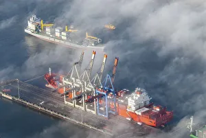 Aerial view of a container ship of the shipping company Hamburg Sued the Monte Olivia at the terminal Burchardkai