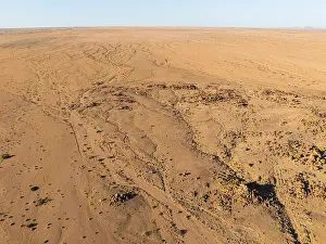 Aerial view, dry rivers and desert landscape on the Ugab River