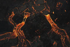Aerial view, erupting volcano, crater with erupting lava and lava flow