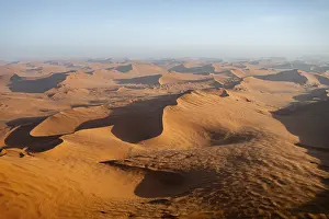 Aerial view, evening mood, red sand dunes of the Namib Desert