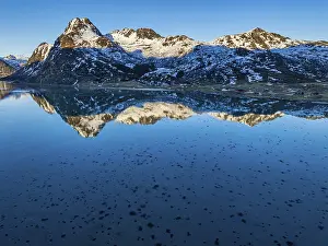 Aerial view of fjord, steep mountains