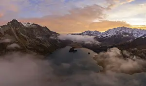 October 2023 Prints: Aerial view over the fog and Lake Sils shortly in front of sunrise in autumn
