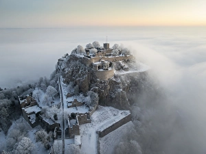 Aerial view of the Hegau volcano Hohentwiel with Germany's largest fortress ruins on a cold