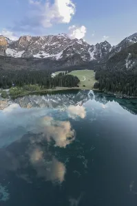 Aerial view of Lago Fusine with the Mangart massif in the background