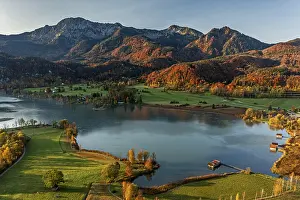 Aerial view of a lake in front of mountains