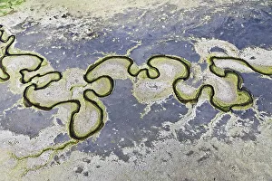 Aerial view of a meandering little river on the southern coast of Iceland