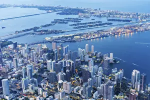 Aerial view of Miami skyline with skyscrapers Downtown Brickell and Miami Beach at night in Miami