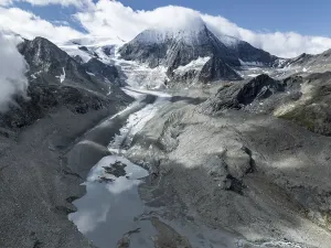Aerial view, mountain landscape with glacier tongue Glacier de Cheilon and summit Mont Blanc de Cheilon