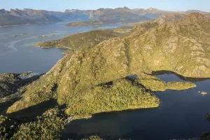 Aerial view of mountains and lake near Mt