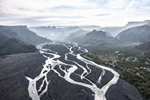 Aerial view, panorama, mountains and glacier river in a mountain valley