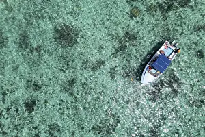 Aerial view, reefs of Flic en Flac beach with excursion boat