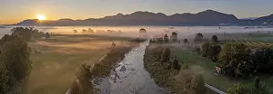 Aerial view, river with fog in front of mountains