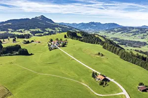 Aerial view of rural road in meadows