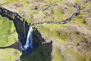 Aerial view, Seljalandsfoss waterfall on the edge of the highlands of Iceland