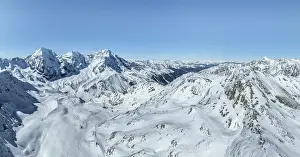 Aerial view, snow-covered mountain landscape
