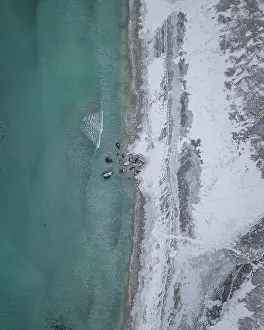 Aerial view, snowy beach, coast, Flakstad, Norway