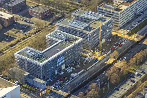 Aerial view, Stadtkrone-Ost, construction site with new building