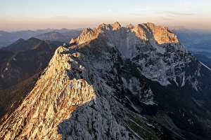 Aerial view, sunset, alpenglow in the mountains