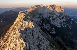 Aerial view, sunset, alpenglow in the mountains