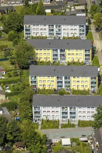 Aerial view, Four terraced houses multi-family houses with coloured facade