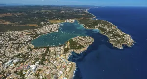 Aerial view, town view and marina of Portocolom